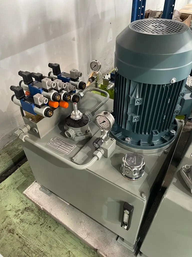 Hydraulic power pack with motor and valve manifold