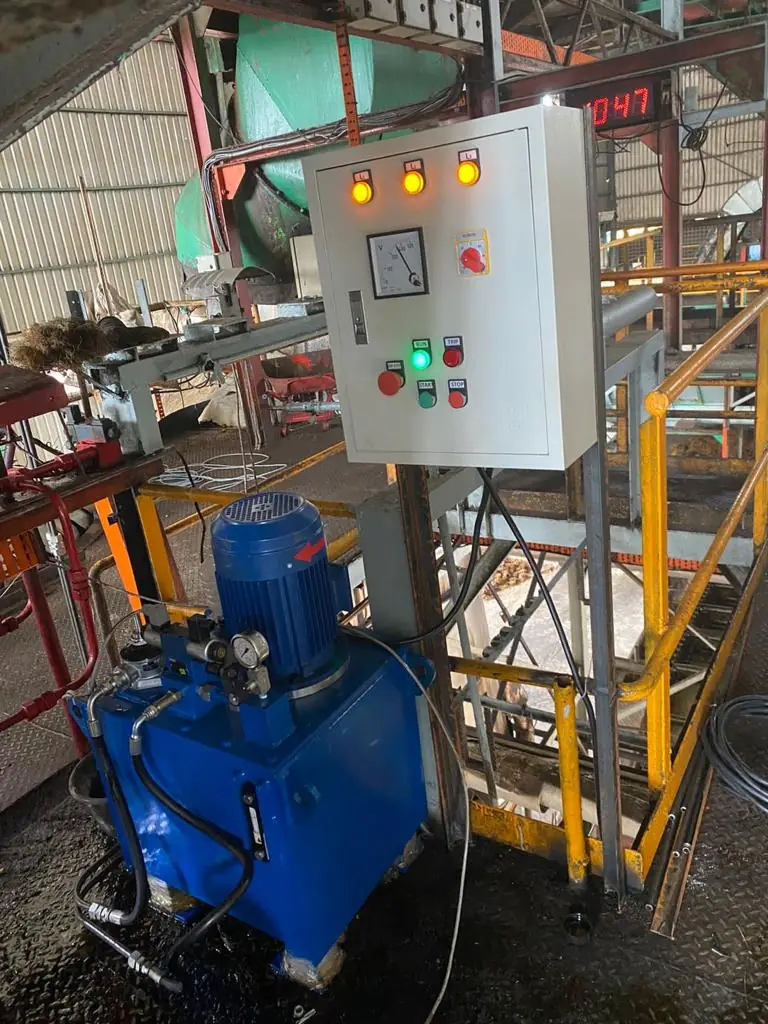 Hydraulic power unit with control panel for a sterilizer