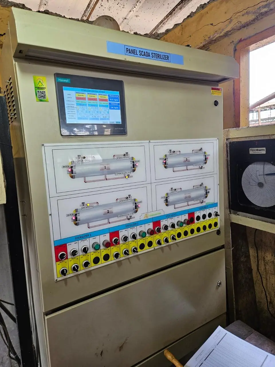 SCADA sterilizer panel with HMI screen and mimic diagram of four sterilizers